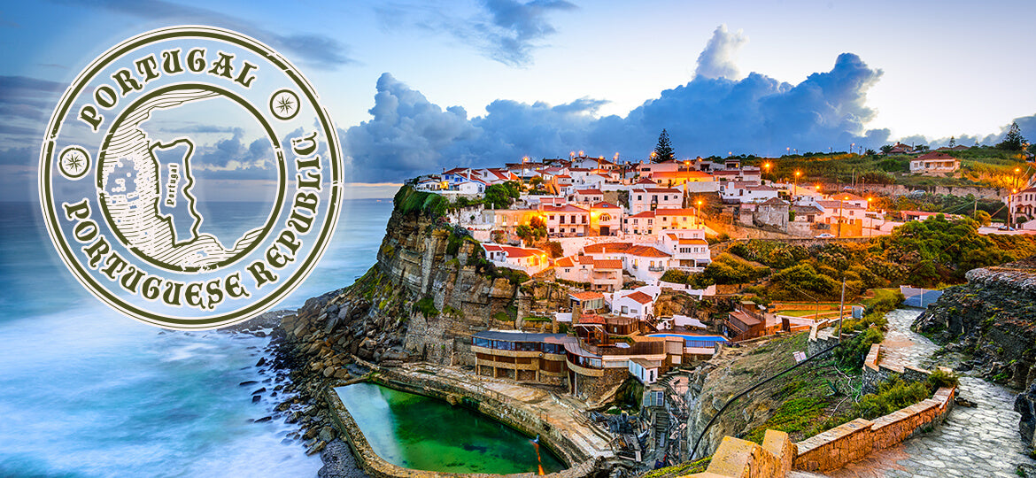 Coastal town in Portugal with a scenic view and Portuguese Republic emblem.