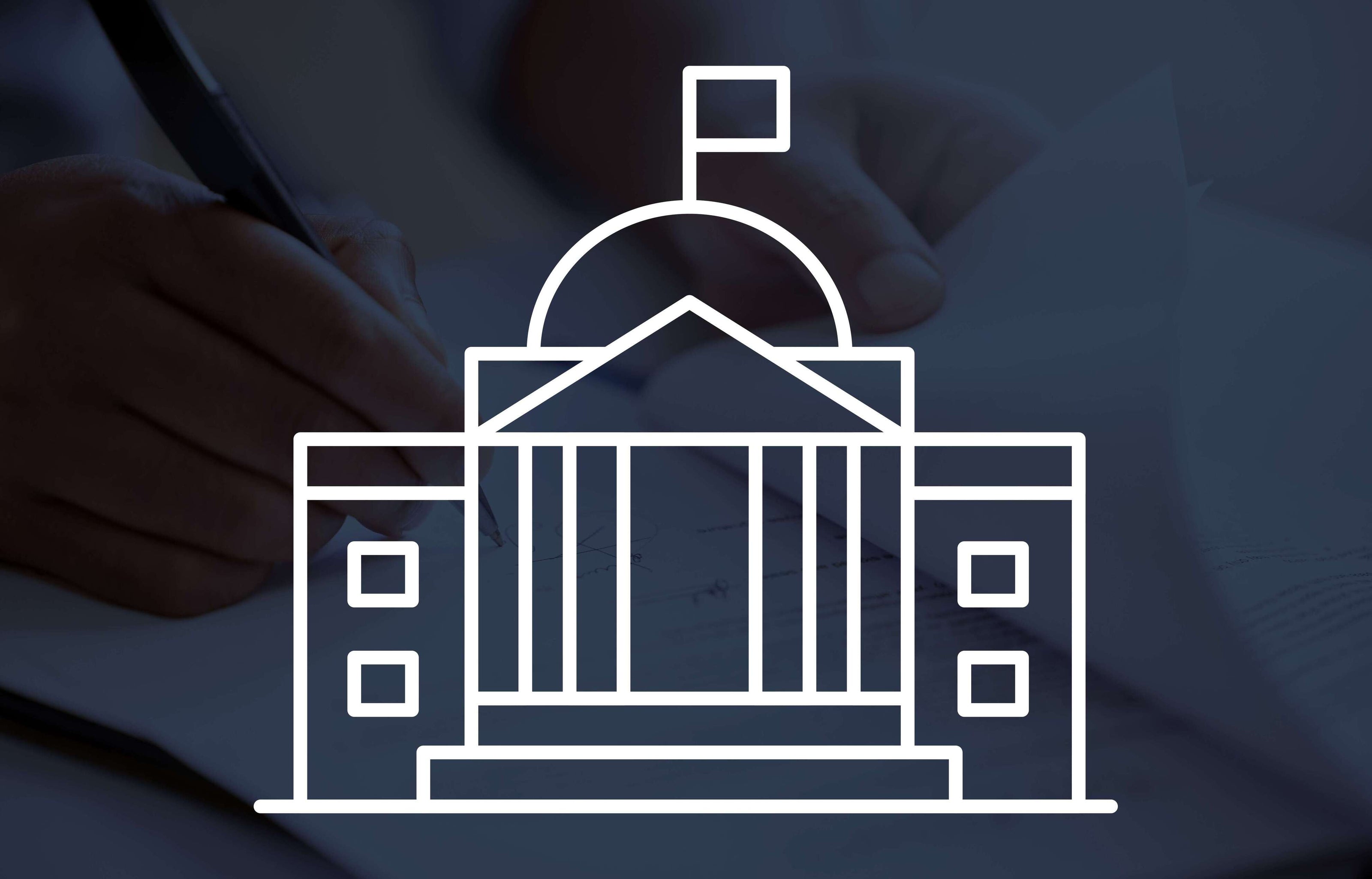 Outline of a government building with a person in a suit in the background