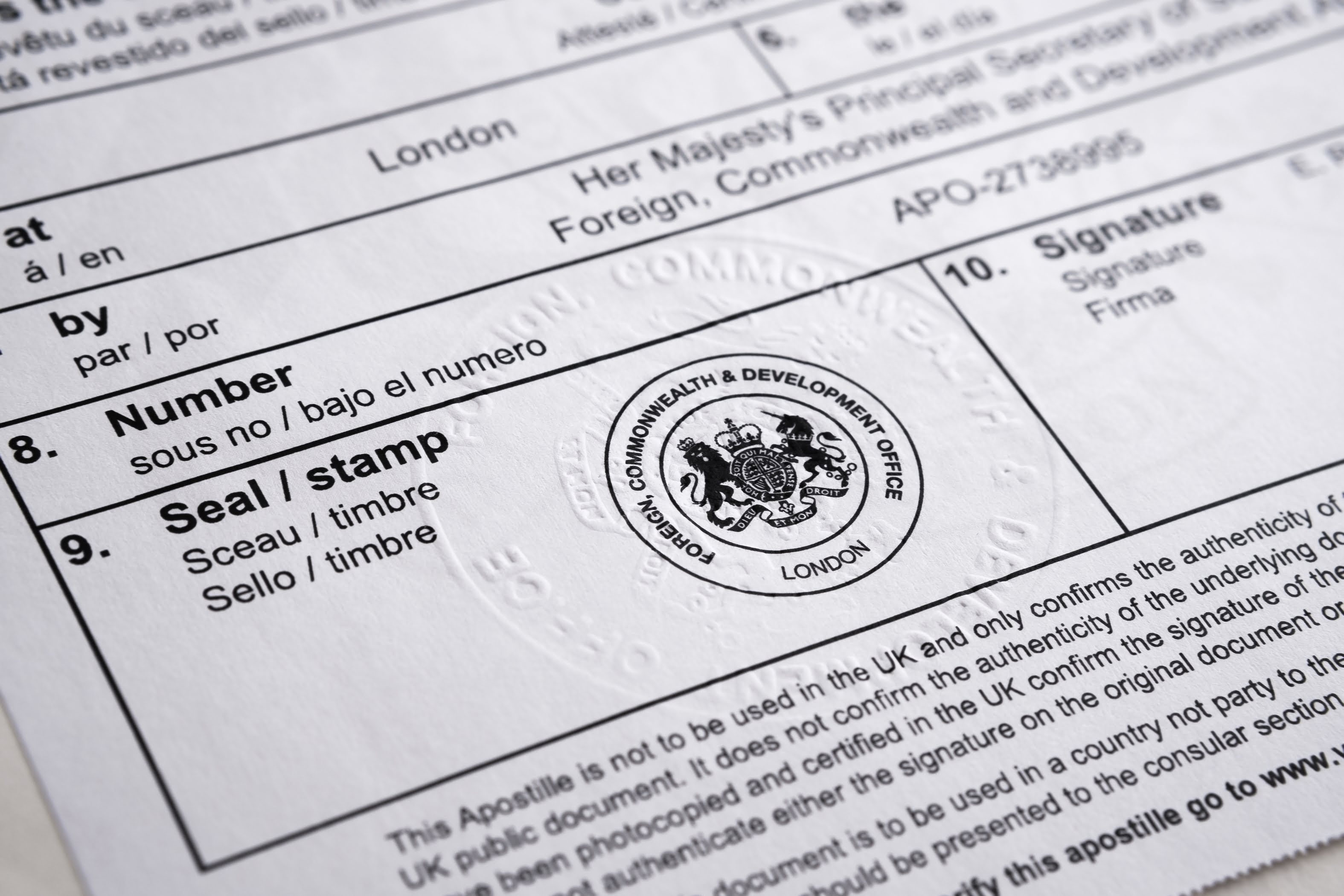 Document with a stamp and seal, likely an official government form.