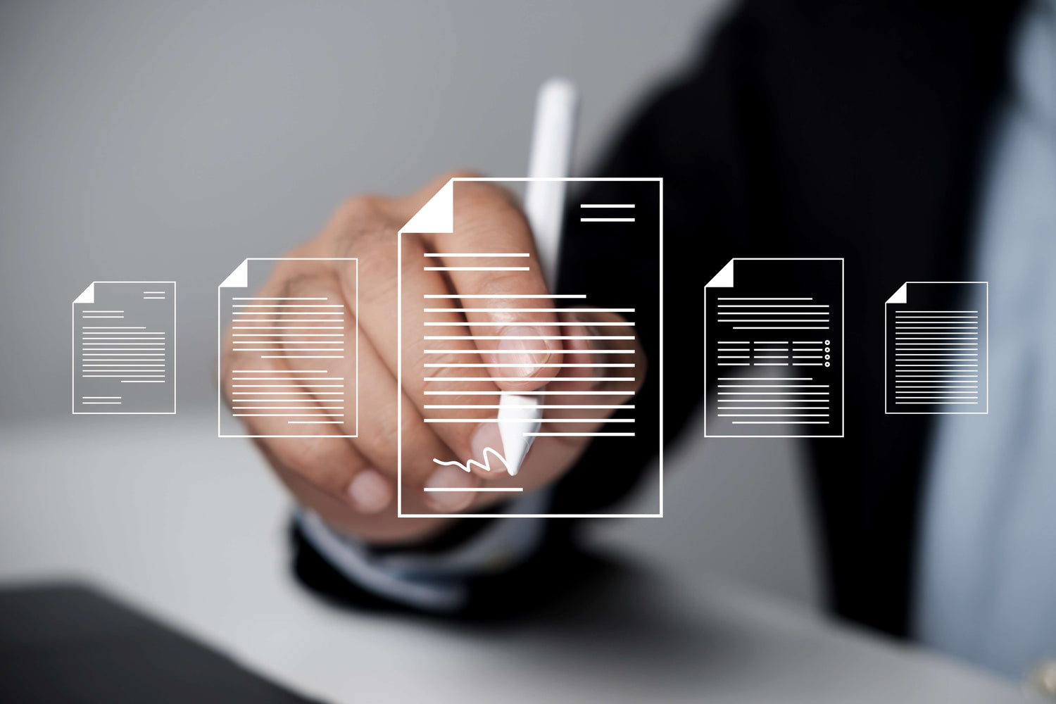 Hand holding a pen with digital document icons on a blurred background